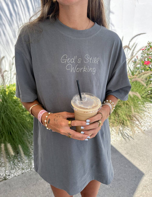 GOD'S STILL WORKING Unisex Tee
